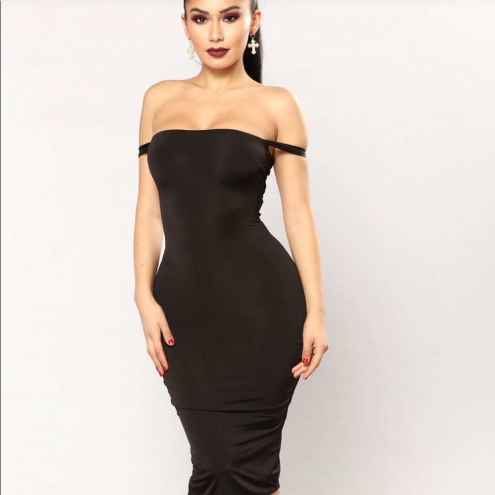 Black lace up back dress.